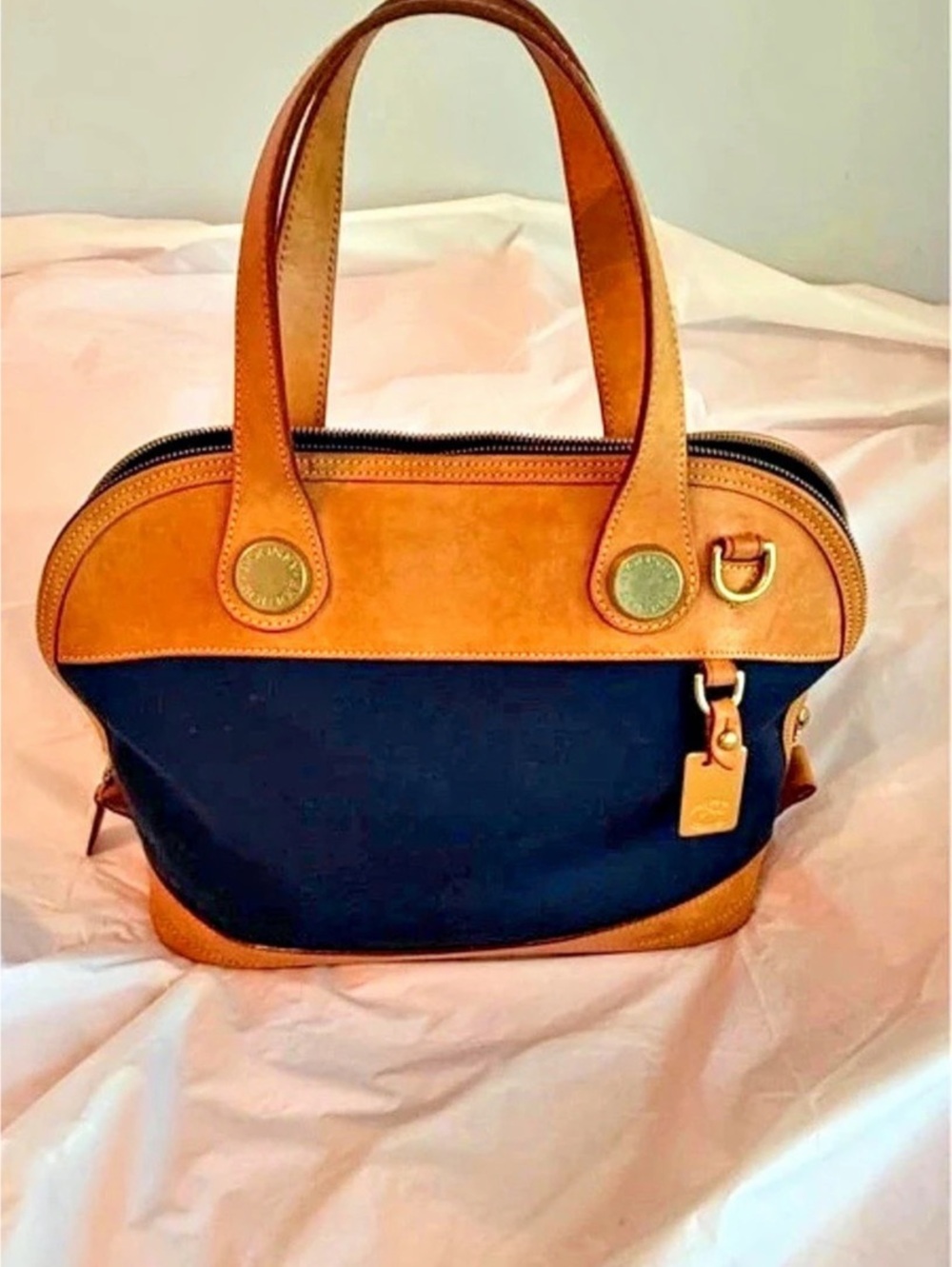 Dooney & Bourke Leather Tote in Navy & Brown. Like new. No shoulder strap.